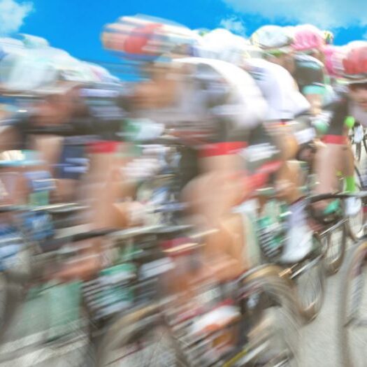 group-of-cyclist-during-a-race-motion-blur-picture-id1025521070